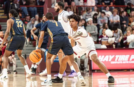 Chris Davis Jr. plays defense at the top of the key