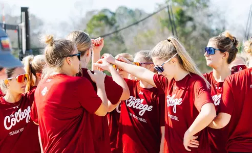 Beach Volleyball huddle at practice