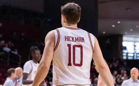 Connor Hickman walks to team bench