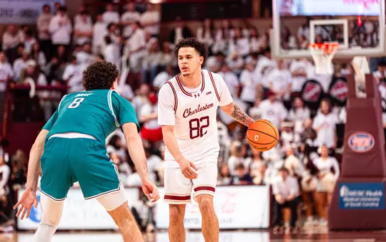 Jlynn Counter dribbles the ball