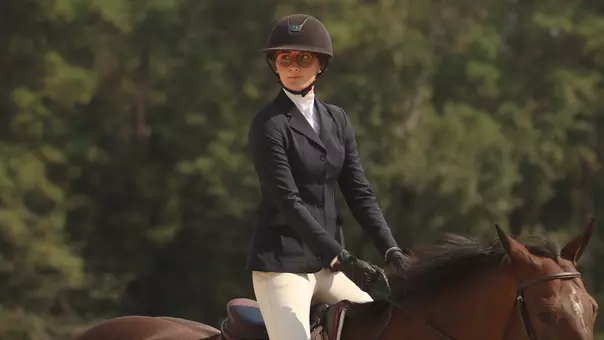 Lucia Bellafiore riding a horse.