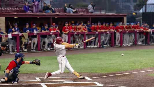 Stow Rogers swinging at a ball.