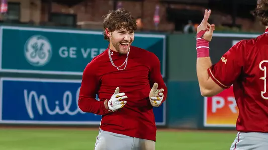 Jake Amman celebrating a walk off win Feb. 27 against JMU.