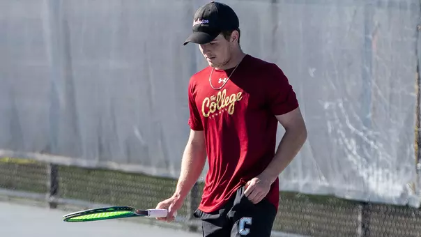 Jake Smith prepares to serve