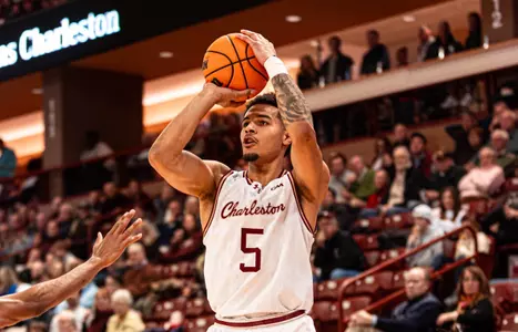 Martin Kalu shoots the basketball
