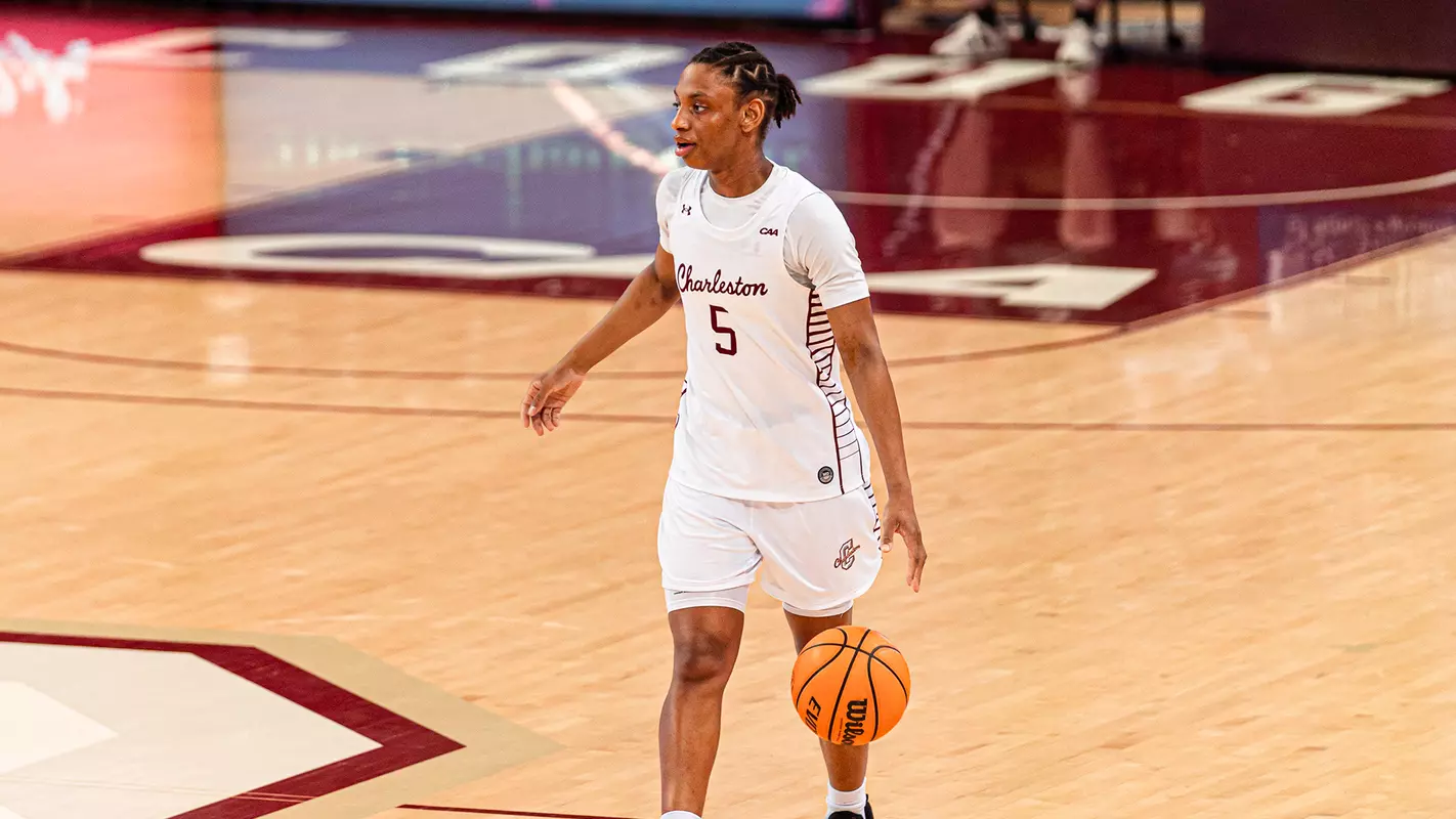 Taryn Barbot brings ball up the court