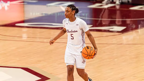 Taryn Barbot brings ball up the court
