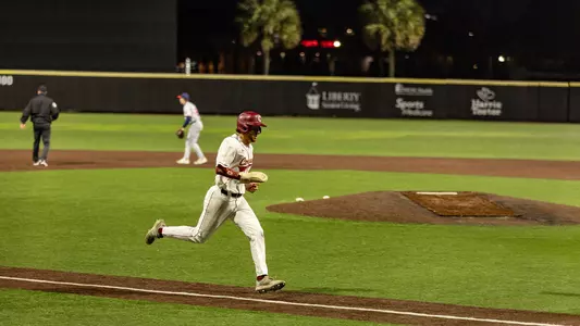 Jake Amman running home March 13 vs Stony Brook.