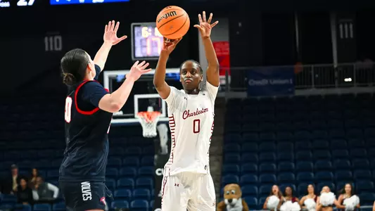 Taylor Barbot shoots three against Stony Brook