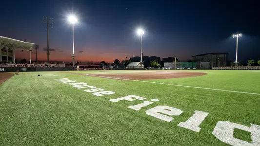 A low angle photo at night of Patriots Point baseball field.