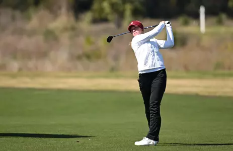 Carys Fennessy swings the club