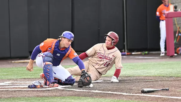 Stow Rogers sliding into the plate March 17, 2026 against UNCW.