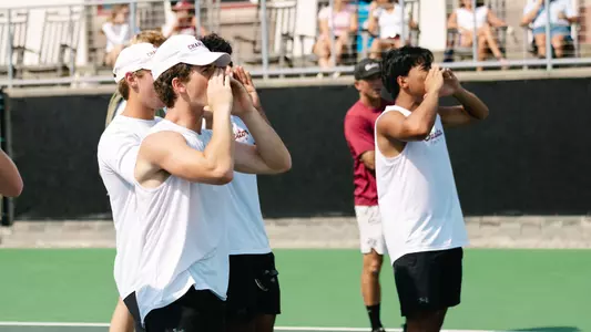 Jake Smith and Eddie Vo cheer on teammates