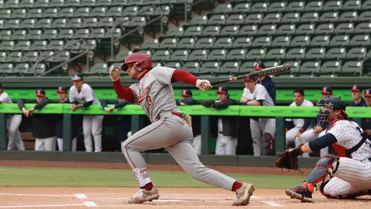 Jake Amman hitting a single Feb. 28 against Illinois.