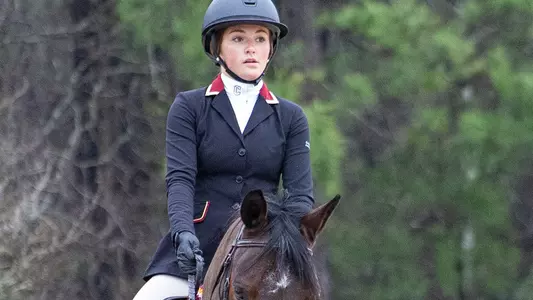 Equestrian rider competing against Lynchburg.