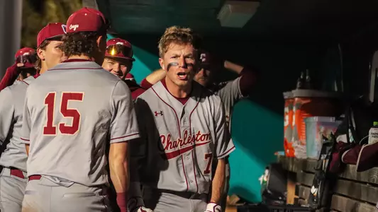Jackson Berini celebrating in the dugout at Coastal Carolina.
