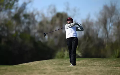 Molly Hardwick swings the club