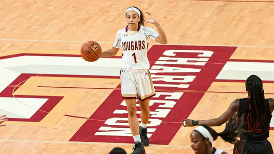 Nola Henry brings ball up the floor