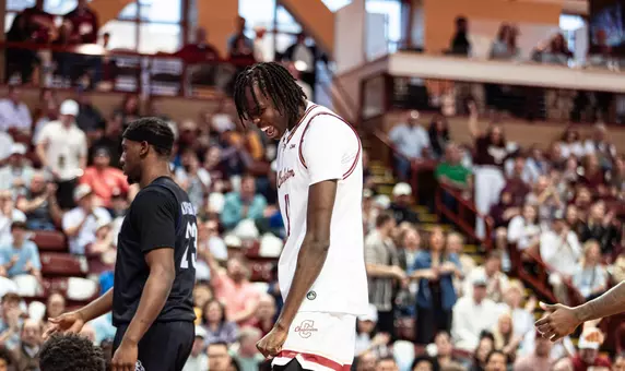 Chol Machot celebrates after a basket