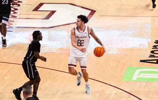 Jlynn Counter dribbles the ball across halfcourt
