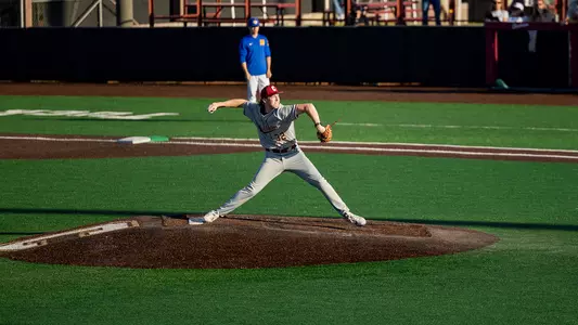 Carter Harrington throwing a pitch against UNCW.