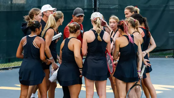 Women's tennis team huddle