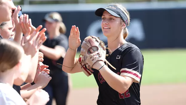 Audri Bates high fiving her teammates