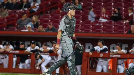 Dylan Johnson walking back behind the plate at South Carolina.