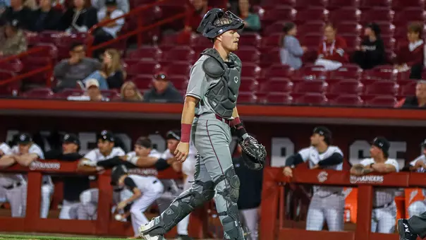 Dylan Johnson walking back behind the plate at South Carolina.