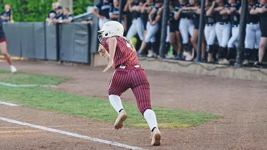 Austy Miller running from home plate to first base at Patriots Point