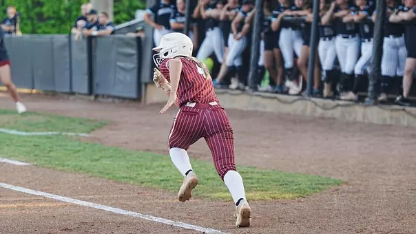 Austy Miller running from home plate to first base at Patriots Point