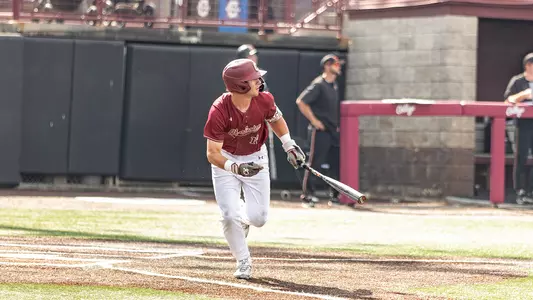 Ethan Plyler swinging a bat vs Campbell.