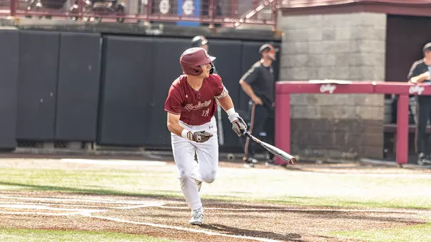 Ethan Plyler swinging a bat vs Campbell.