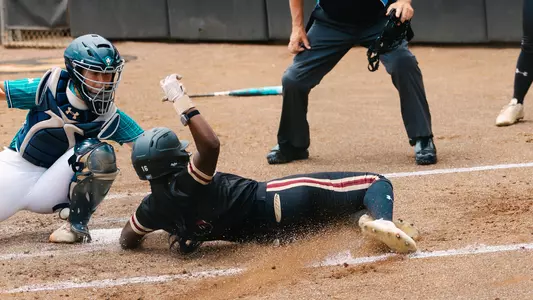 Savannah Scott sliding into home