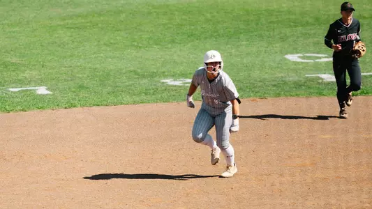 Halle Cannon celebrating a home run