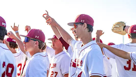 Nick Diaz and team in a huddle.