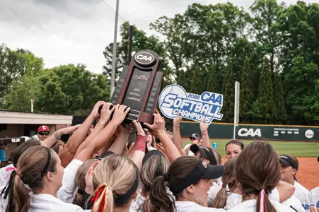 Team holding up the CAA Trophy