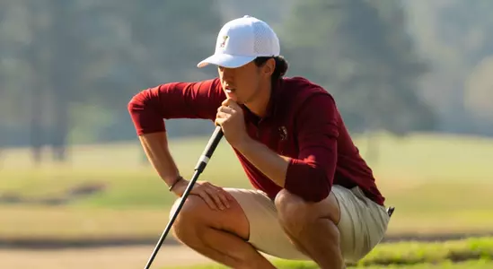Loran Appel looks at the ball path