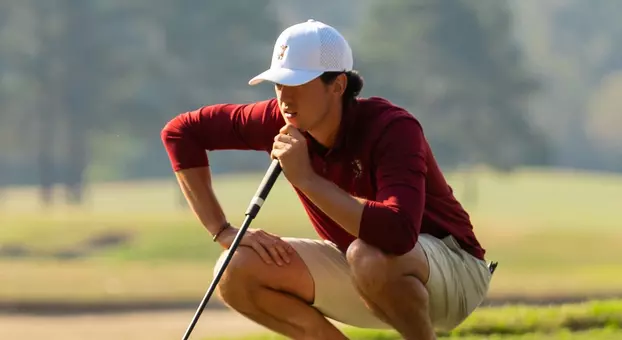 Loran Appel looks at the ball path