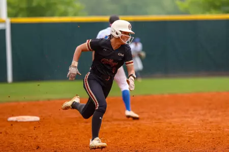Bronwyn Conroy running from second to third base