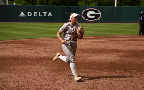 Austy Miller runs in from the outfield