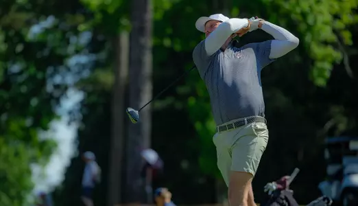 Nevill Ruiter swings the club