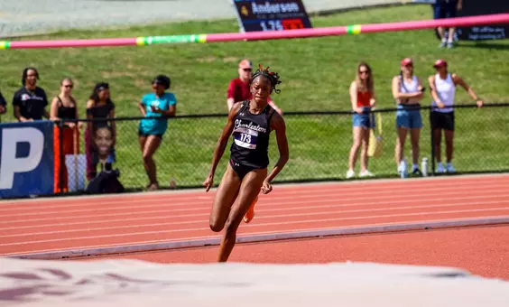 Tori-Ann Anderson high jumping at the CAA Championships