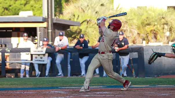 Landon Penfield swinging a bat May 5 at Charleston Southern.