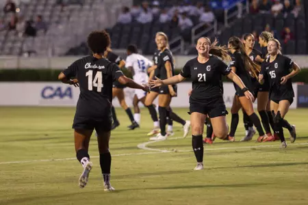 Antoni and Heffernan Celebrate after a goal to high five each other