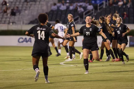 Antoni and Heffernan Celebrate after a goal to high five each other