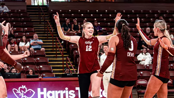 Caroline Noonan celebrating with teammates Aug. 14, 2026 vs Wofford.