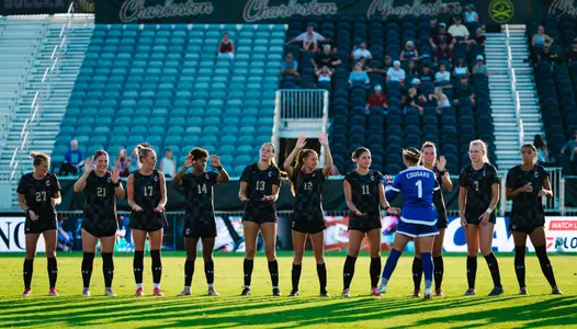 Women's Soccer starters lined up before the game