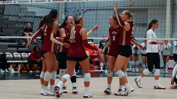 Charleston volleyball celebrating a point at South Carolina.
