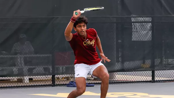 Ram Mude swings tennis racket